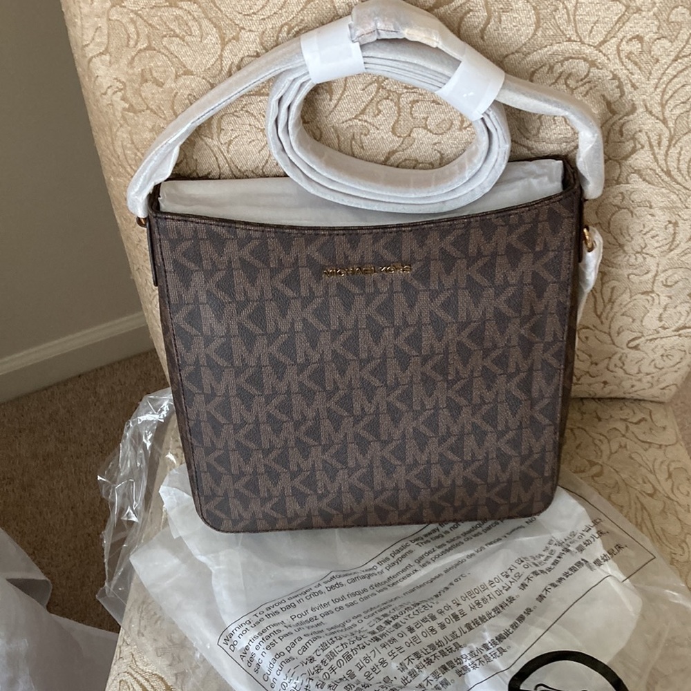 This Michael Kors shoulder bag is packaged straight from the stock room